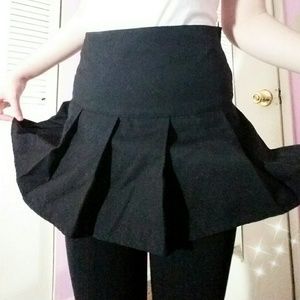 black pleated skirt
